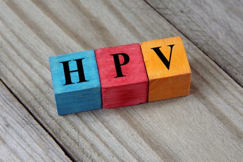 HPV (human papillomavirus) acronym on colorful wooden cubes 