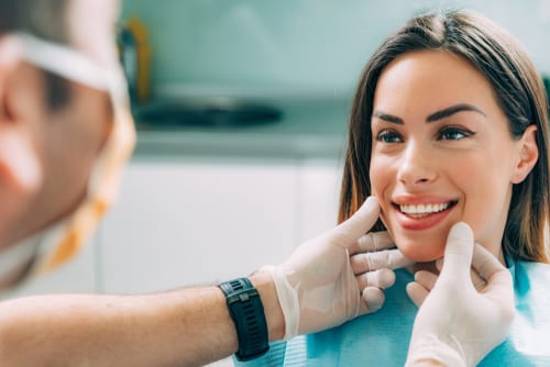 Woman getting a dental exam