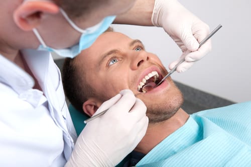 Patient undergoing a dental exam