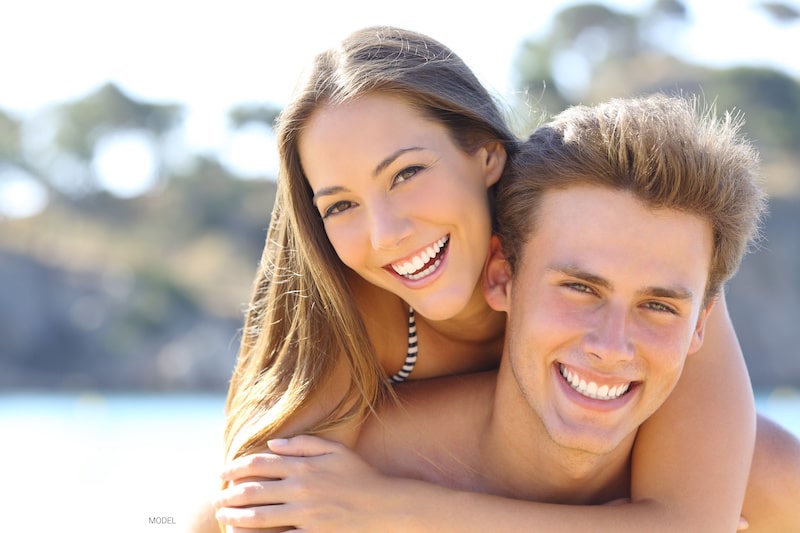 A beautiful couple with perfect smiles.